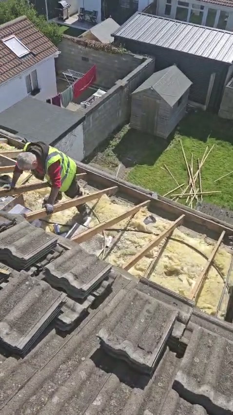 Old roof → New roof — before photo of roofing work by Mikey & Sons